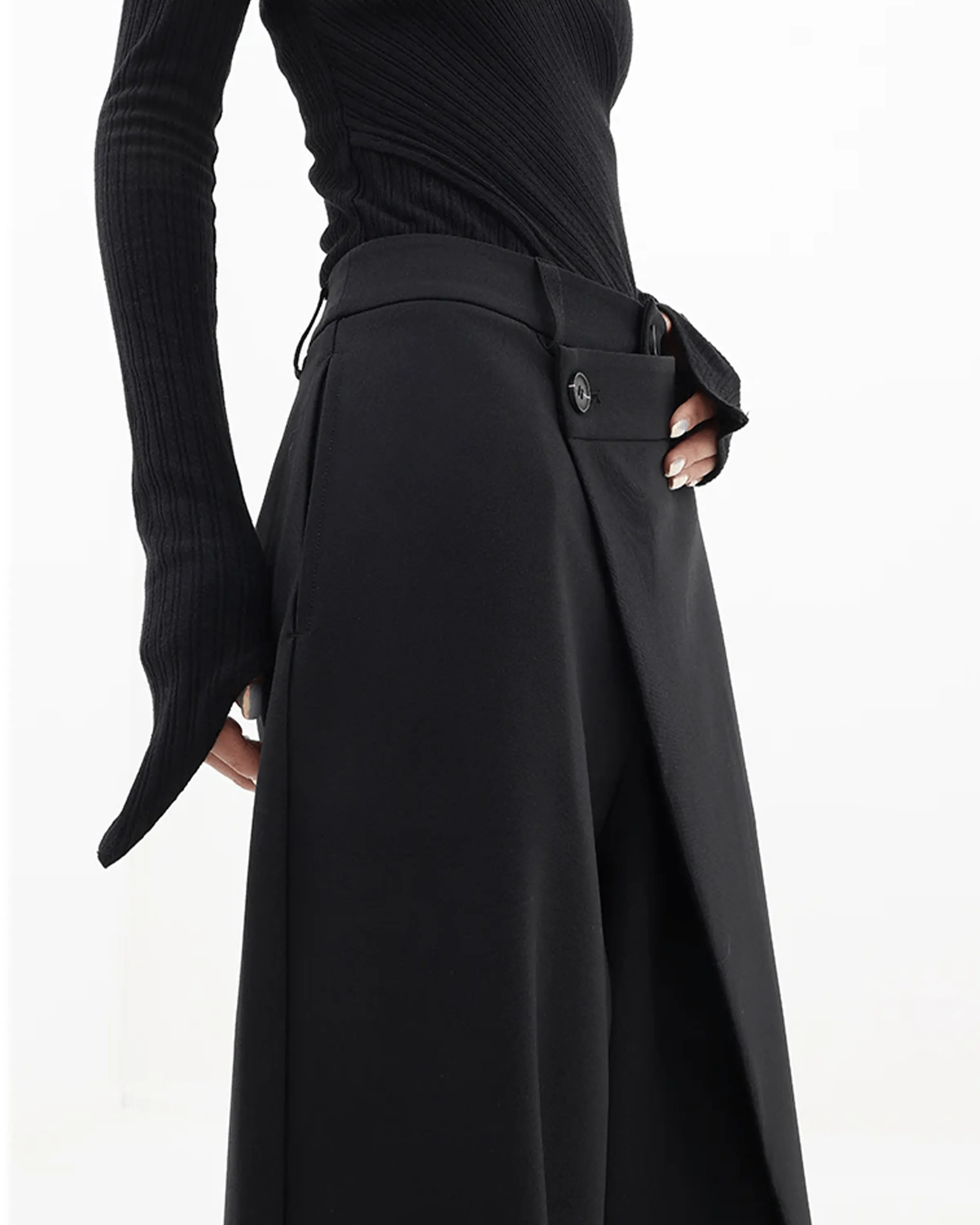ASYMMETRICAL CROSS PANEL TROUSERS